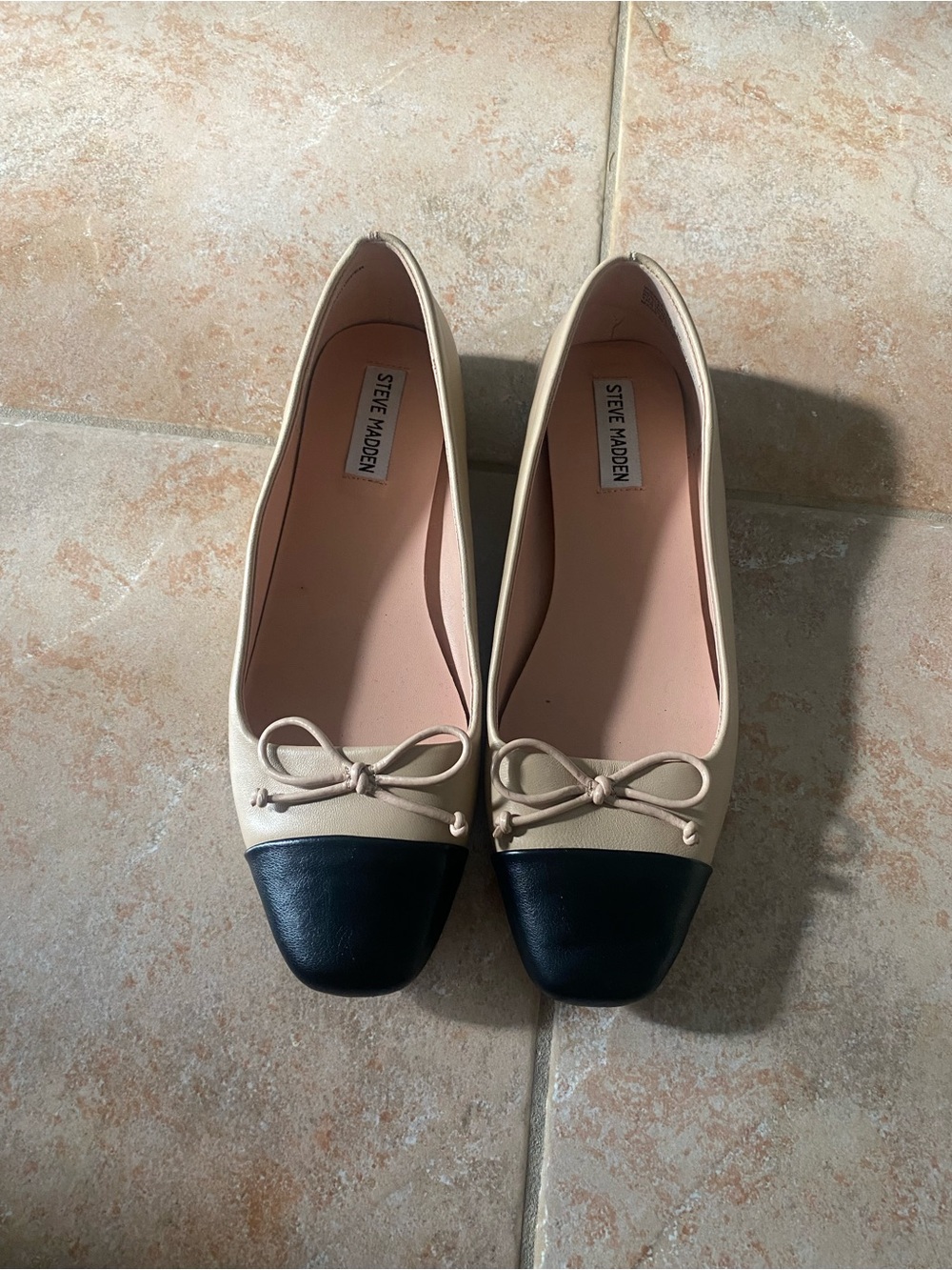 Steve Madden Beige Flats with Black Cap Toe and Bow